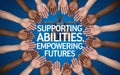 Empowerment banner with hands supporting a person with disabilities Royalty Free Stock Photo