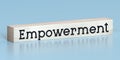 Empowerment - word on wooden block