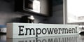 Empowerment - word on wooden block