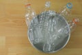 Emptied recyclable clear plastic mineral soda water bottles in a
