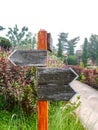 Emptied wooden direction sign