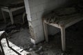 Hazard empty abandoned hospital concept with bed and broken glass in war zone or technogenic accident or chemical attack