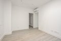 Empty air-conditioned bedroom with porcelain stoneware floors