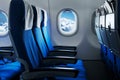 Empty air plane seats. Airplane interior Royalty Free Stock Photo