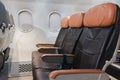 Empty aircraft seats and windows, passenger seat interior airplane