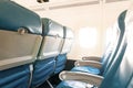 Empty aircraft seats and windows. Travel background