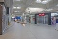 Empty airport departure hall area with closed shops