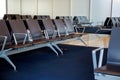 Empty airport departure lounge terminal waiting area with chair Royalty Free Stock Photo