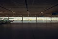 Empty airport terminal due to coronavirus pandemic and suspended airline flights. Empty airport terminal. Mechanical corridor with