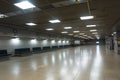 empty airport terminal with emergency lights and sirens, indicating emergency situation