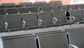Empty airport terminal lounge. Empty airport seating - typical black chairs in boarding waiting Royalty Free Stock Photo