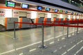 Empty airport terminal with separation tapes in Warsaw, Poland. Flight delay concept.