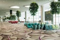 Empty airport terminal waiting area with chairs