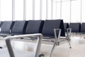 Empty airport terminal waiting area with chairs. Close up photo Royalty Free Stock Photo