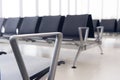 Empty airport terminal waiting area with chairs. Close up photo Royalty Free Stock Photo