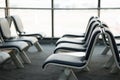 Empty airport terminal waiting area with chairs lounge with seat Royalty Free Stock Photo