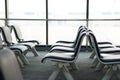 Empty airport terminal waiting area with chairs lounge with seat Royalty Free Stock Photo