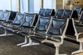 Empty airport terminal waiting area with seats in the departure lounge Royalty Free Stock Photo