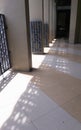 Empty aisle of mosque with sun beam in the morning