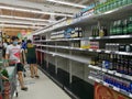 Empty alcohol shelves in supermarket.