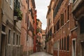 Empty alley in Venice, little movement of people, horizontal orientation