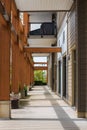 Empty alley walkway nearby office buildings. Modern City street in downtown. Urban big city life concept background Royalty Free Stock Photo