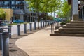 Empty alley walkway nearby office buildings. Modern City street in downtown. Urban big city life concept background Royalty Free Stock Photo