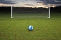 Empty amateur football goal blue leather football