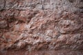 Empty ancient raw rough nature pink red stone concrete texture wall for retro restaurant, website Royalty Free Stock Photo