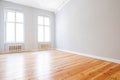 Empty apartment room with wooden floor in new flat Royalty Free Stock Photo