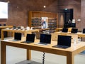 Empty Apple Store Displaying MacBooks and iPads