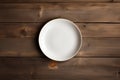 empty artistic ceramic Glazed earthenware white fancy shape plate, golden cutlery on side.