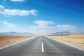 Empty asphalt highway along desert with mountains on horizon