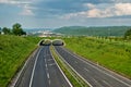 Empty asphalt highway with ecoduct Royalty Free Stock Photo