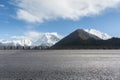 Empty asphalt highway with snow mountain background