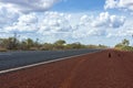 Empty asphalt road through Australian outback. Central Australia Royalty Free Stock Photo