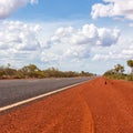 Empty asphalt road through Australian outback. Central Australia Royalty Free Stock Photo