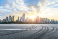 Asphalt road and Chongqing cityscape at sunset Royalty Free Stock Photo