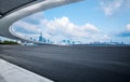 Empty asphalt road and city buildings skyline Royalty Free Stock Photo