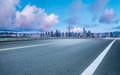 Empty asphalt road and city buildings skyline Royalty Free Stock Photo