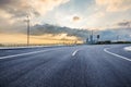 Empty asphalt road and city buildings skyline Royalty Free Stock Photo