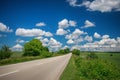 Empty asphalt road with cloudy sky Royalty Free Stock Photo