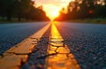 Empty asphalt road with double yellow line at sunset. Warm sun light reflects on wet surface. Trees line the pavement vanishing Royalty Free Stock Photo