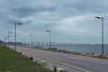 Empty seaside road at dusk