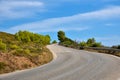 Empty asphalt road on the green mountain Royalty Free Stock Photo