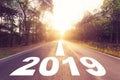 Empty asphalt road and New year 2019 concept. Driving on an empty road to Goals 2019. Royalty Free Stock Photo