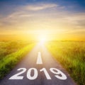 Empty asphalt road and New year 2019 concept. Driving on an empty road to Goals 2019. Royalty Free Stock Photo
