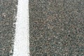 Empty asphalt road. New fresh asphalt pavement away from the city. Development of rural infrastructure. Road marking lines close Royalty Free Stock Photo