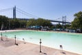 Empty Astoria Park Pool during Summer with the Triborough Bridge in the Background in Astoria Queens New York