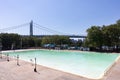 Empty Astoria Park Pool during Summer with the Triborough Bridge in the Background in Astoria Queens New York